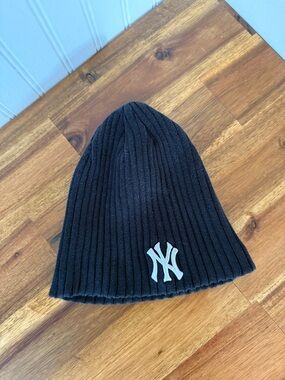 New Era Black Ribbed Beanie with White NY Logo